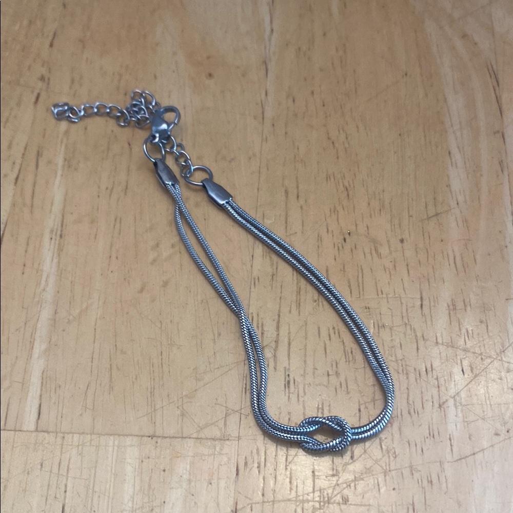 Elegant Silver tone Knot Bracelet adjusts 6.5 to 9 in